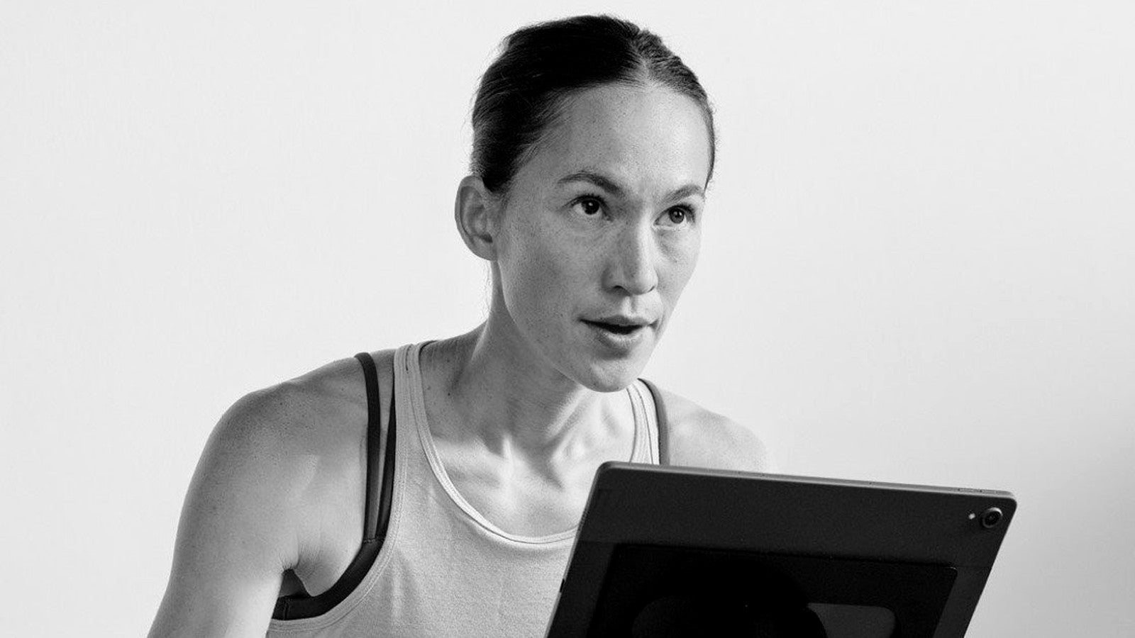 Rider focused on the CAROL Bike screen mid-session
